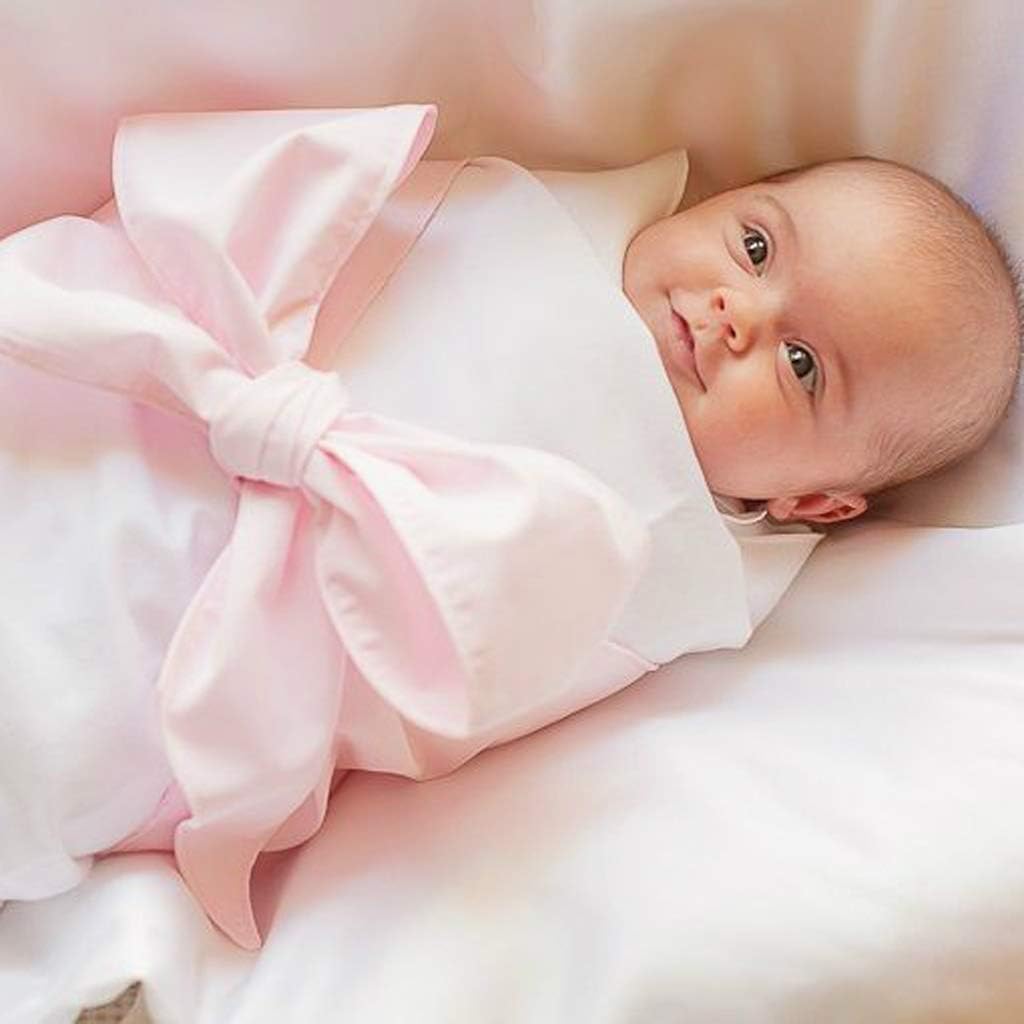 Envoltura tela bebé cintura lazo rosa maternidad