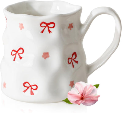 Taza de café de cerámica pintada a mano con lazos