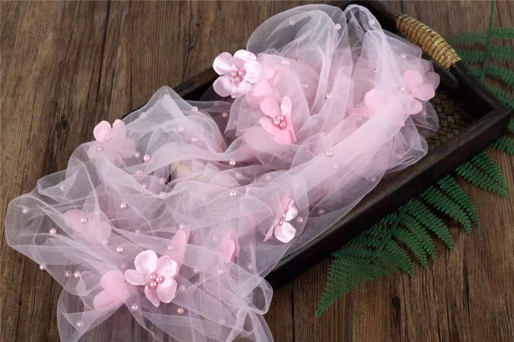 Manta envolvente bebé con perlas florales rosa claro