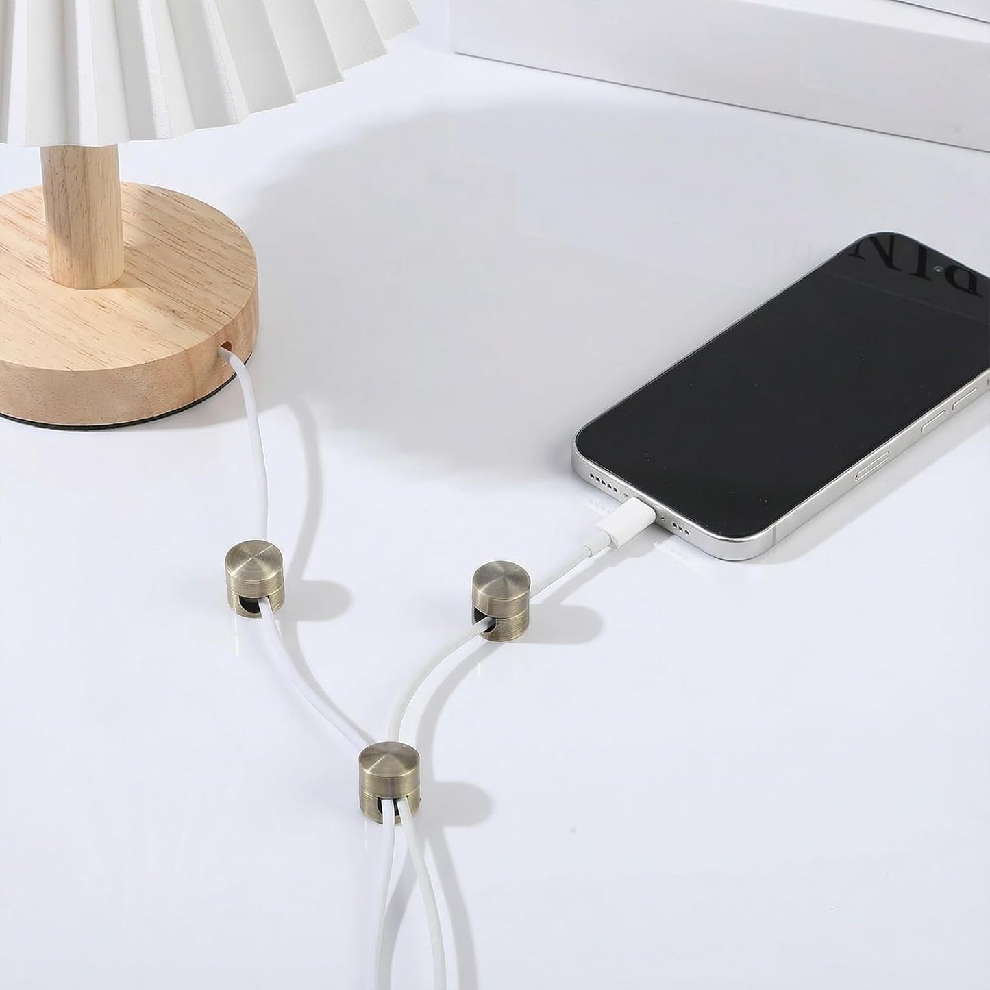 Soporte adhesivo para cables bronce ajustable