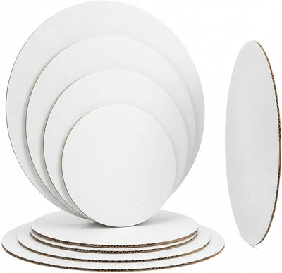 Paquete de 12 tableros redondos surtidos para pasteles 6-12" bases cartón blanco resistente