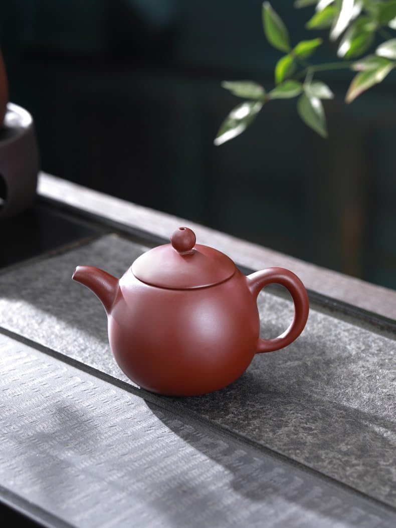 Tetera de arcilla Zhuni roja con infusor para té suelto
