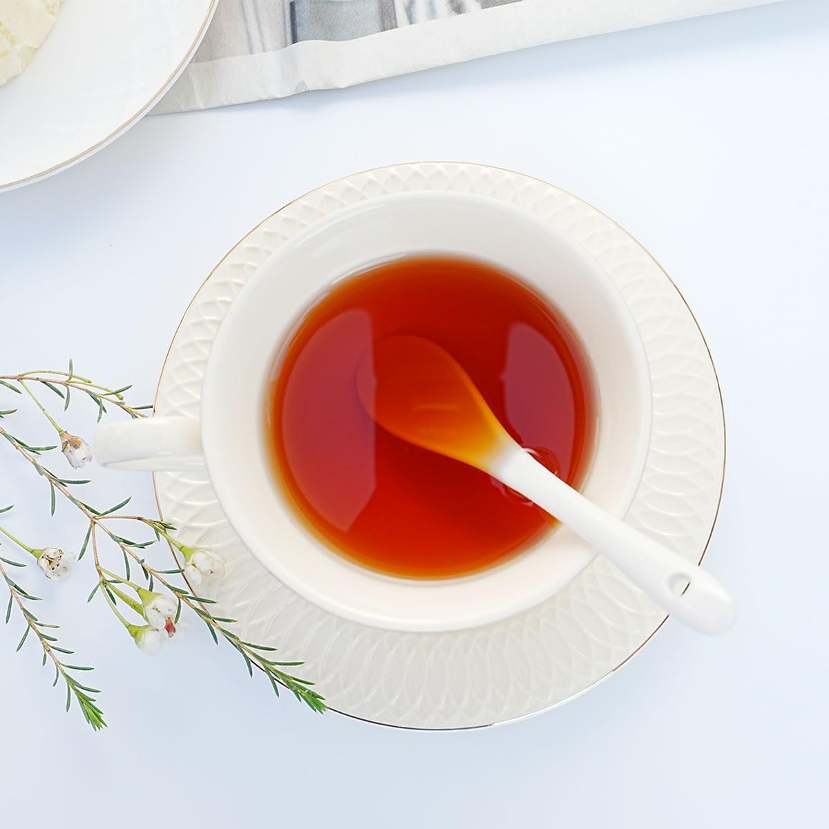 Juego de taza de té y platillo de porcelana de hueso con cuchara elegante floral