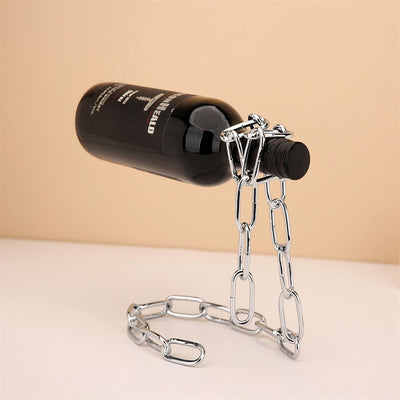 Soporte flotante para botellas de vino de metal plateado