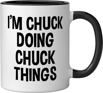 Taza cerámica divertida Chuck haciendo cosas Chuck en negro/blanco