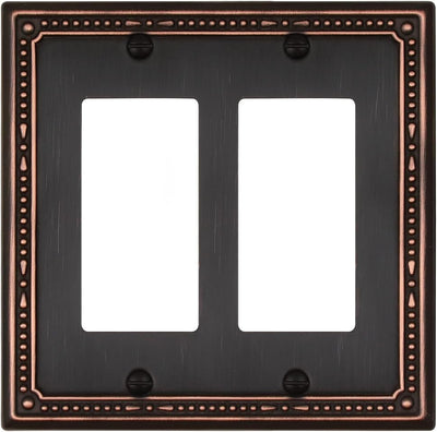 Placa pared doble bronce perlas enchufes GFCI