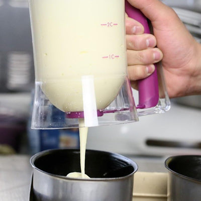 Dispensador de masa para panqueques, cupcakes y gofres con mango de apretar