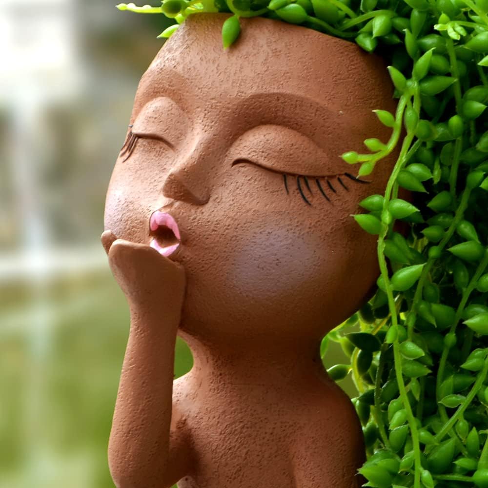 Maceta con cara de mujer para suculentas y plantas