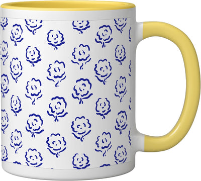 Taza cerámica pintada a mano con diseño flores azules y amarillo/blanco