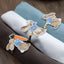 Set 3 servilleteros Pascua metal dorado con conejo
