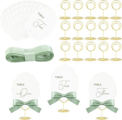 Juegos de mesa de boda Sabary con soportes dorados y cintas verde menta