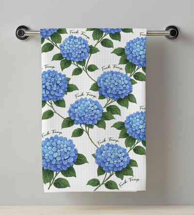 Toalla de cocina con flores de hortensia anti Trump