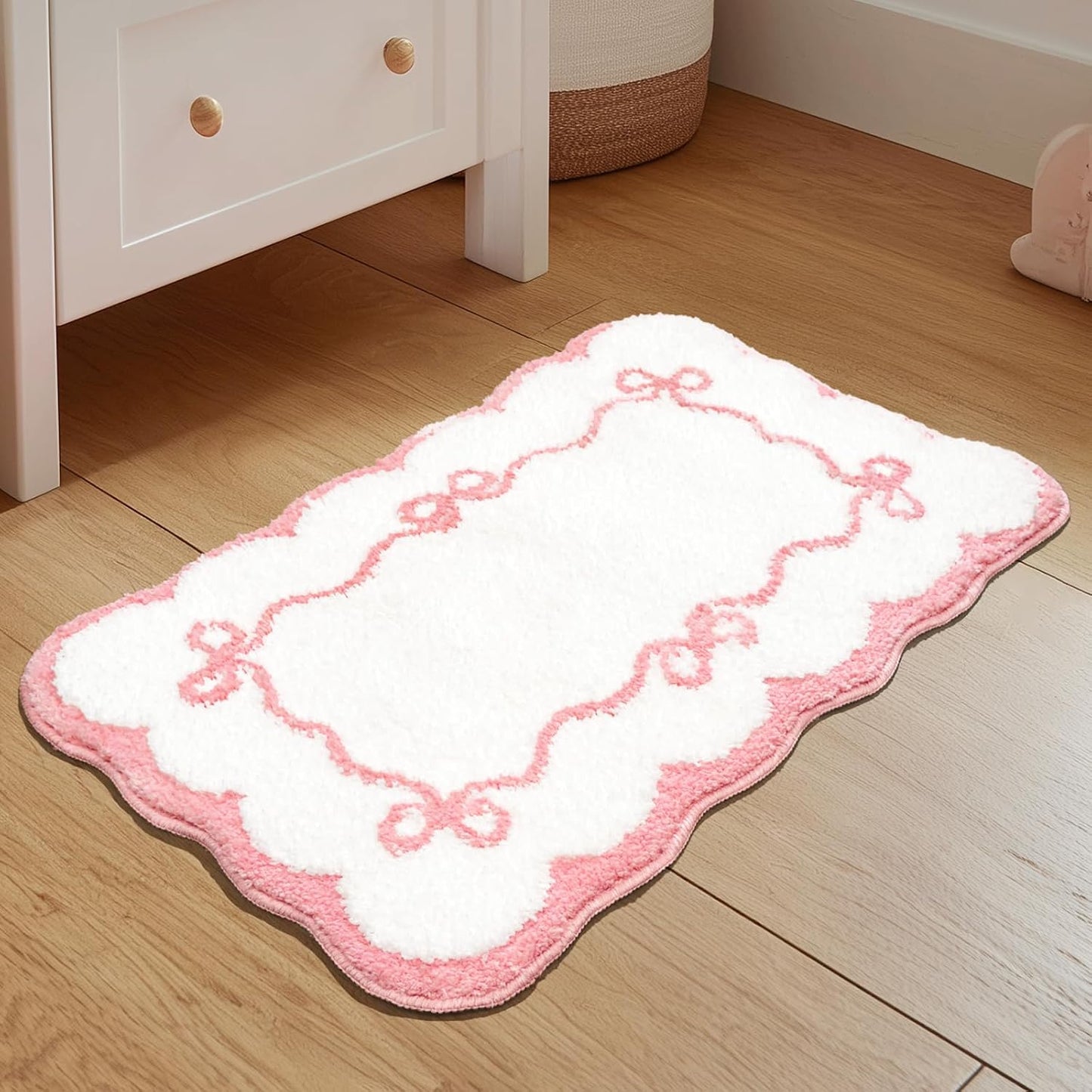 Alfombra baño lazo festoneado rosa microfibra antideslizante