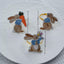 Set 3 servilleteros Pascua metal dorado con conejo