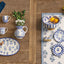 Plato de ensalada de flores redondas azules de gres