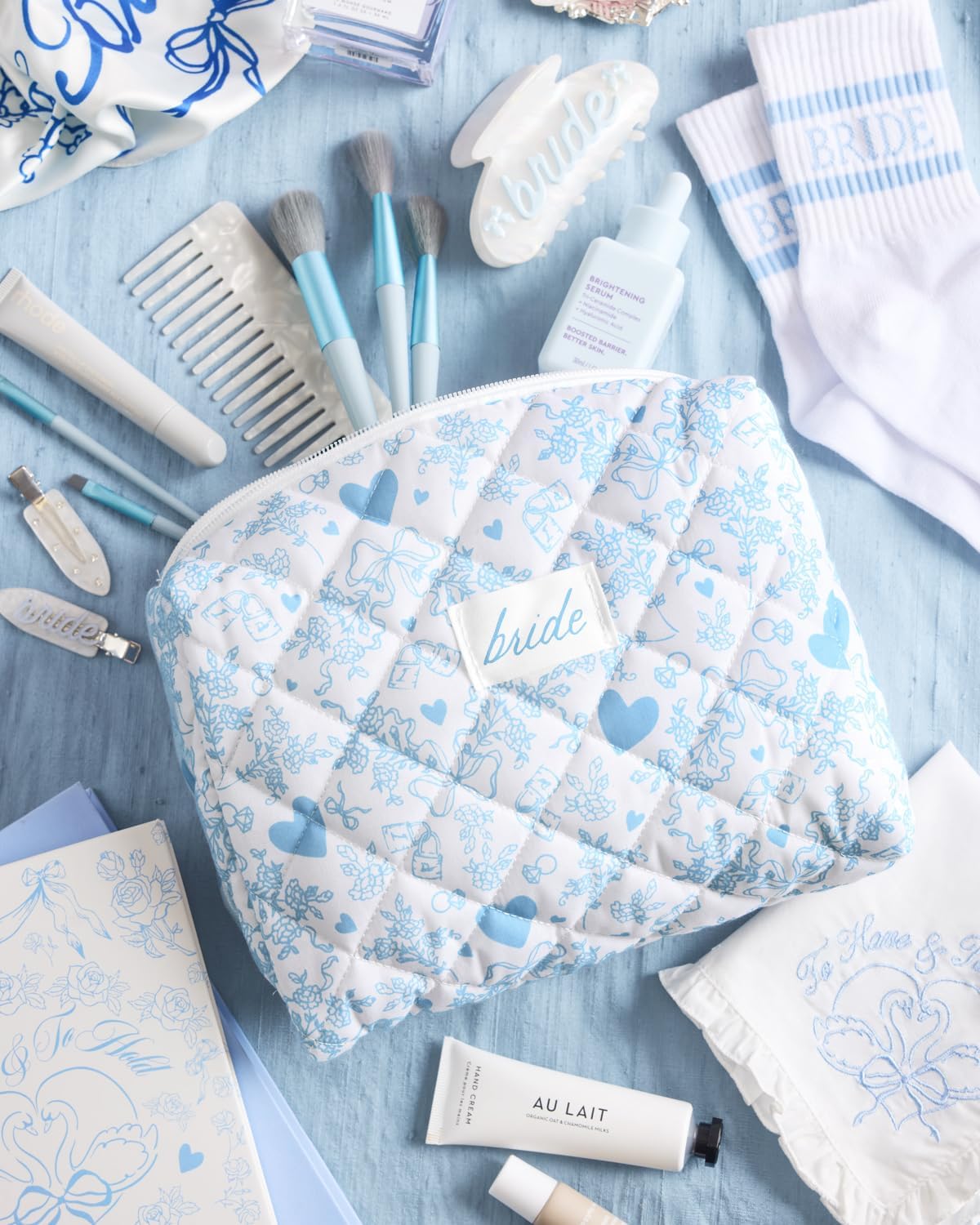 Bolsa cosméticos acolchada algo azul regalo despedida soltera