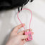 Candado combinación 4 dígitos rosa acero inox cable 12pulg