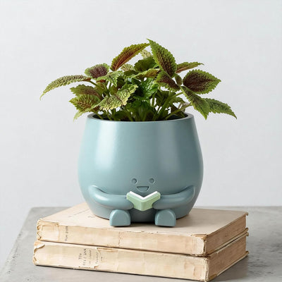 Maceta cara sonriente resina con tapón drenaje decoración hogar