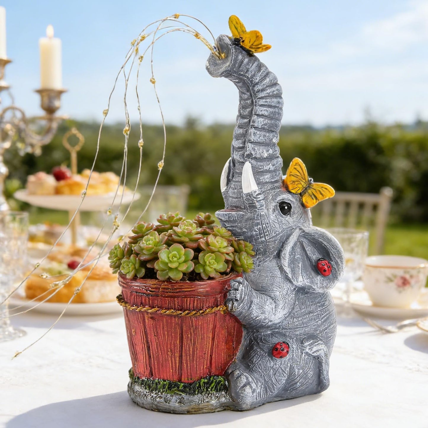 Estatua elefante solar resina jardín con regadera y luces hadas