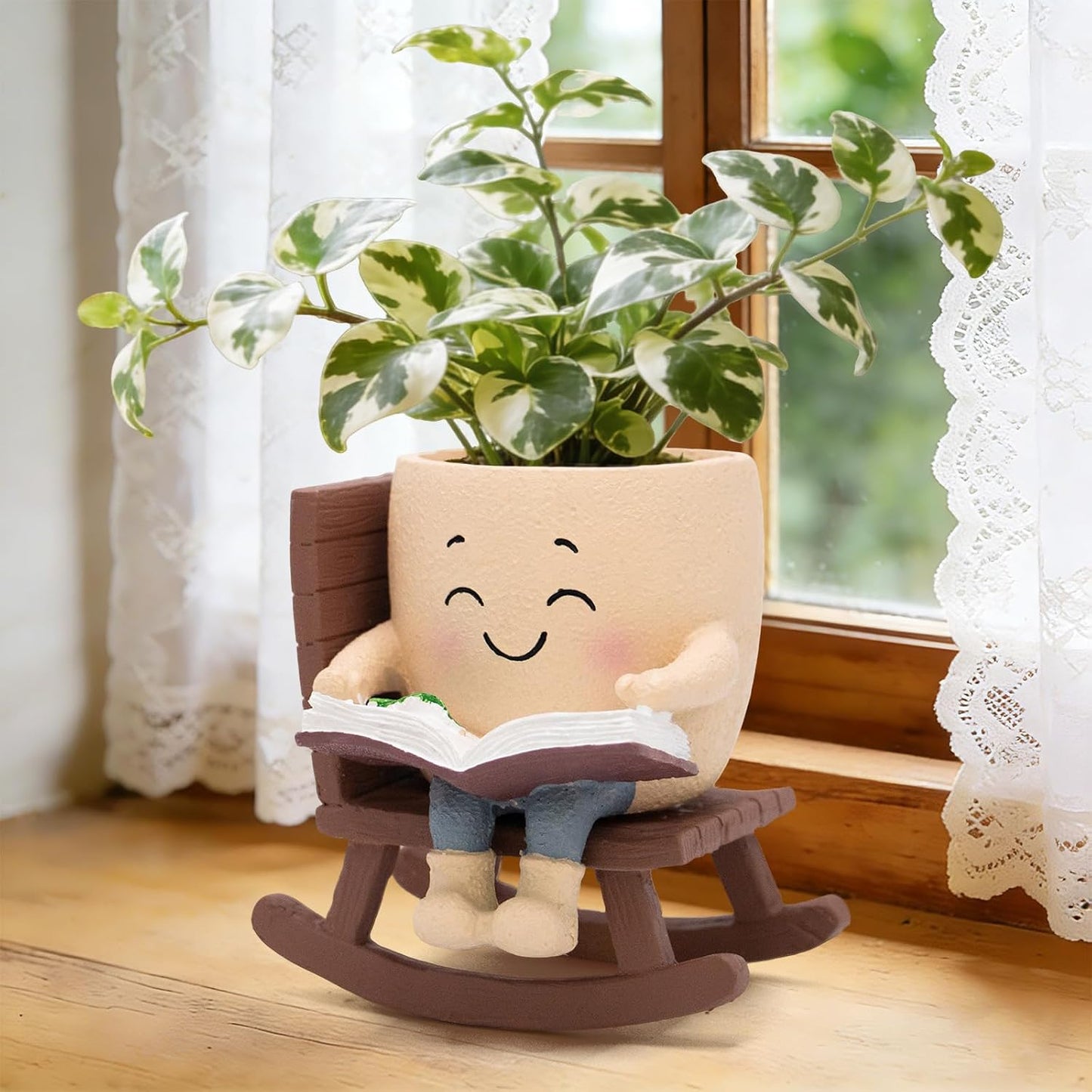 Maceta mecedora para libros con flor de resina