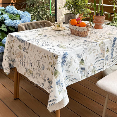 Mantel rectangular de lino impermeable con estampado de hojas azules y verdes para exterior