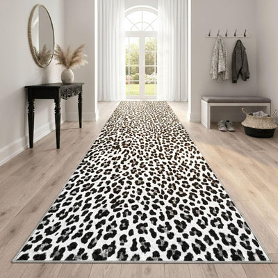Tapete para puerta interior Ottomanson 1'10.5" x 4' antideslizante lavable estampado leopardo blanco y negro