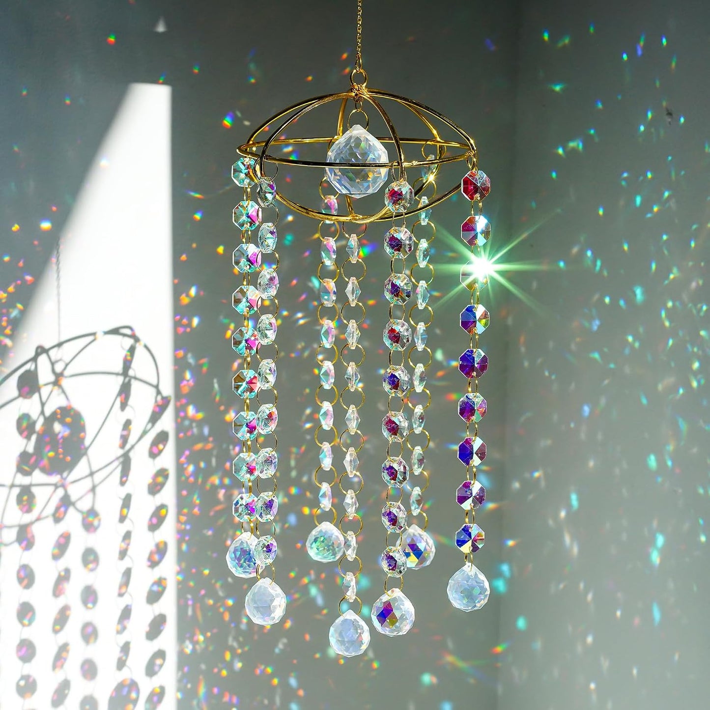 Atrapasoles cristal dorado forma planeta decoración
