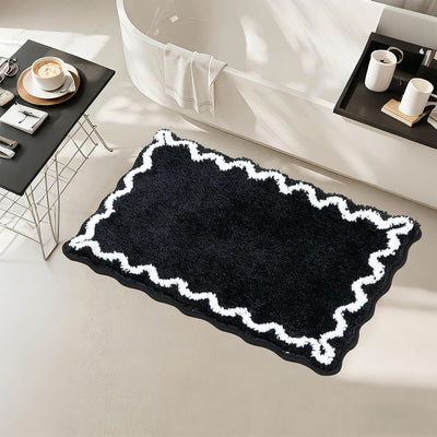 Tapete baño negro festón blanco antideslizante 17x24pulg