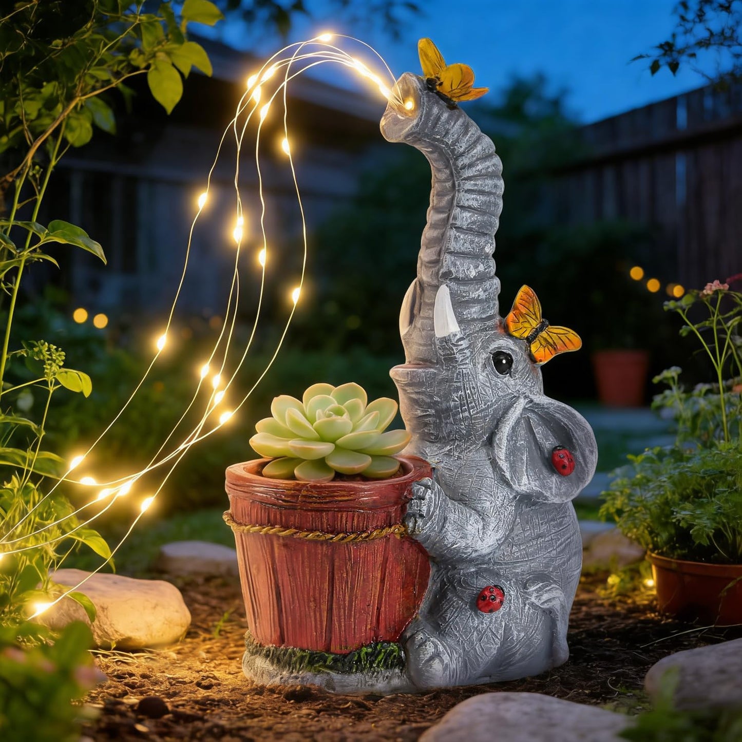 Estatua elefante solar resina jardín con regadera y luces hadas