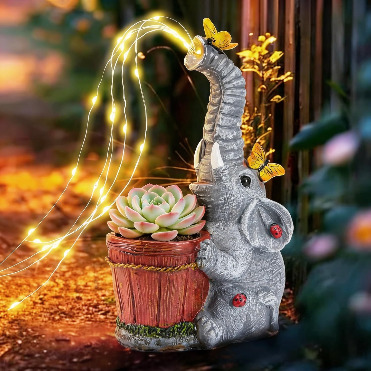 Estatua elefante solar resina jardín con regadera y luces hadas