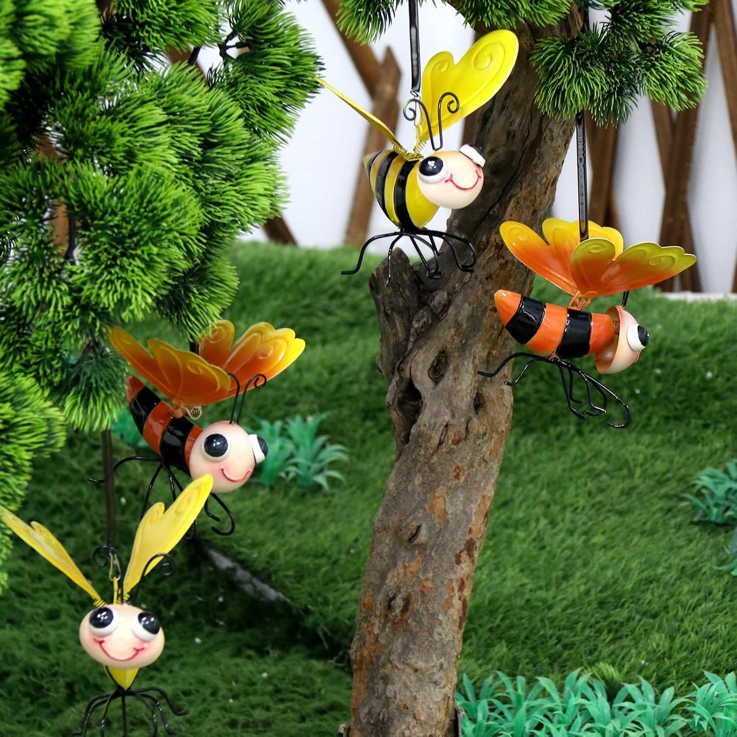 Escultura abeja metal amarillo naranja colgante exterior