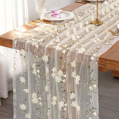 Camino de mesa de gasa marfil con bordado flor 3D de 120 pulgadas y tul transparente