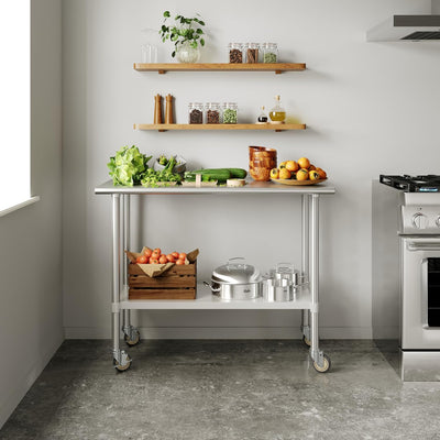 Mesa trabajo móvil acero inox NSF 24x48pulg con estante y ruedas