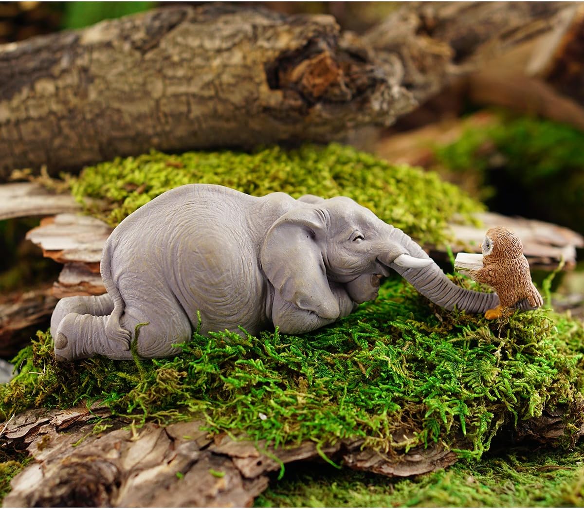 Libro elefante jardín mini con búho gris