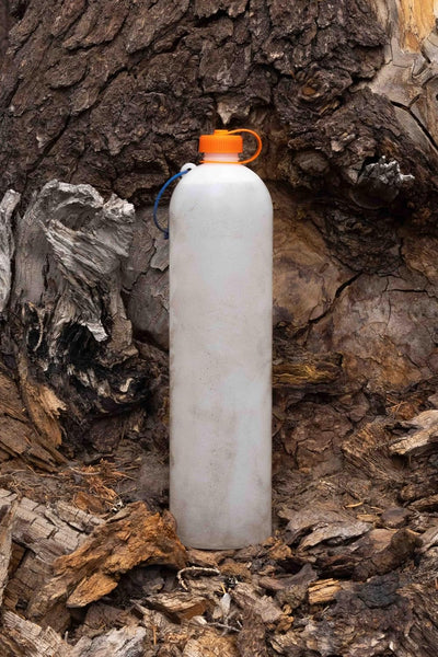 Botella exprimible de 1 litro con cuello delgado y ligero compatible con filtros de agua